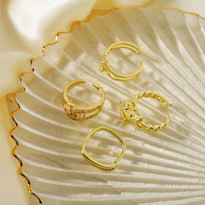 Exquisite 4-piece gold ring set with zircon accents and adjustable open designs
