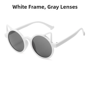 Detail view of white cat-ear frames with grey lenses for stylish kids' sunglasses