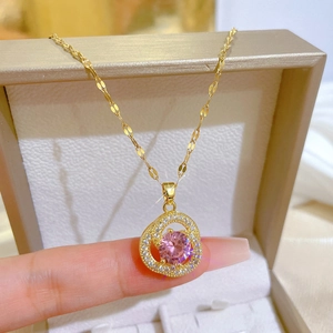 Titanium steel necklace with triple ring flower pendant and pink crystal stone
