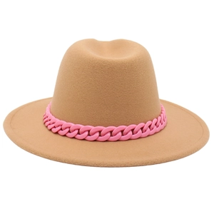 Close-up of camel felt jazz hat featuring a decorative pink thick chain trim on the brim