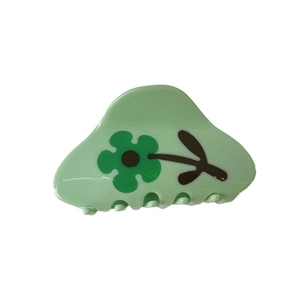 Green tulip flower claw clip with acetate finish and contrast color floral design