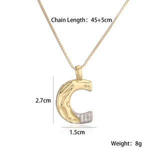 Detail view of gold letter C pendant with dimensions showing 2.7cm height and 45cm chain