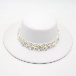 Elegant white flat top wool felt hat with decorative pearls and wide brim for women