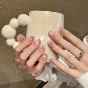 Cat eye press-on nails with pink gradient, hand-painted butterfly bow and pearls