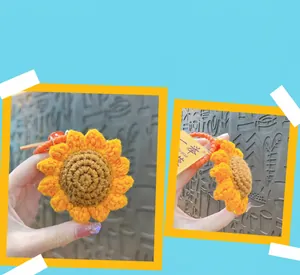 Detailed view of handmade crocheted sunflower keychain with orange spiral wristlet