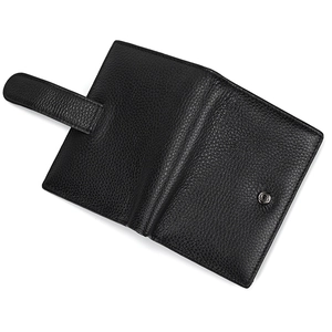 Close-up of black lychee grain genuine leather wallet with secure metal snap fastener