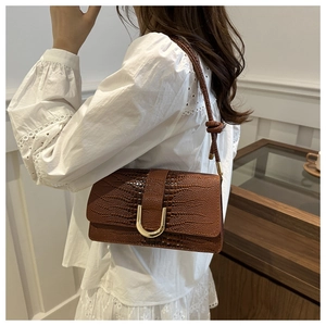 Brown crocodile embossed leather crossbody bag with golden U-shaped buckle for women