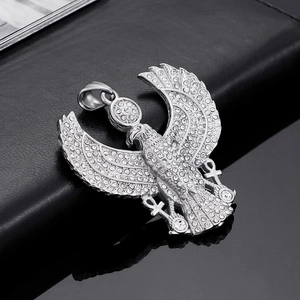 Detail of silver falcon pendant with rhinestones and Ankh symbols on black leather