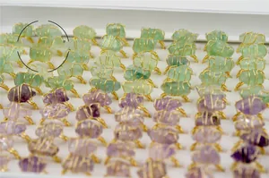 Wholesale collection of handmade gold wire wrapped raw amethyst and fluorite rings