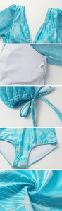 Detail of light blue shell print swimsuit with mesh sleeves and side drawstring ties