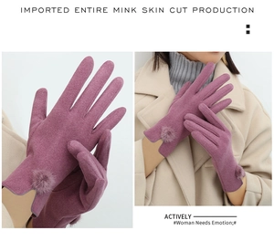 Detail of purple winter gloves for women featuring soft plush fur trim on the wrists