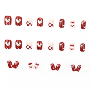 Short Christmas press-on nails with red heart, Santa Claus, and snowflake patterns