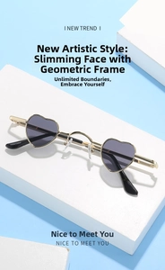 Detailed macro view of heart-shaped gold metal frame sunglasses with model ABA1084