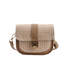 Beige woven straw saddle bag with brown leather trim and golden metal lock