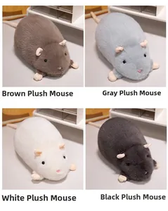Detail view of plush hamster toys in brown, gray, white, and black soft faux fur