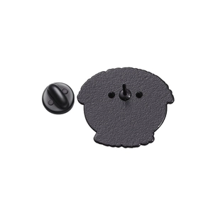 Detail of the black metal brooch base and secure rubber clutch backing components