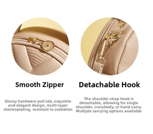 Detail of golden zipper and detachable metal hook on beige V-quilted small handbag