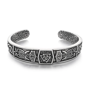 Vintage Viking cuff bracelet with Valknut symbol and Celtic wolf head design in steel