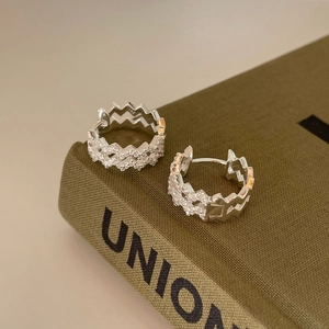 Minimalist S925 sterling silver hoop earrings with shimmering water ripple zirconia gems