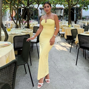 Elegant yellow U-neck bodycon maxi dress with ruched details for summer vacations