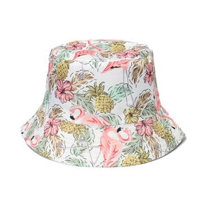 White bucket hat with tropical flamingo and pineapple print for summer beach sun protection