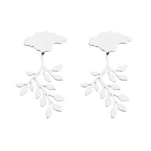 Macro detail of silver leaf drop earrings with polished metallic branch design