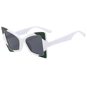 Chic butterfly frame sunglasses in white and green pattern with dark grey lenses