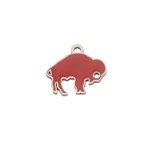 Macro shot of red enamel buffalo pendant charm in polished stainless steel finish