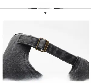 Detail view of adjustable metal buckle and washed denim strap on the baseball cap