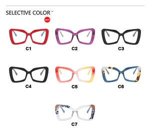 Close-up of seven stylish oversized cat-eye glasses frames in multiple colors and patterns