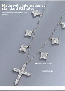 Macro detail of 925 sterling silver cross necklace with sparkling zircon stones