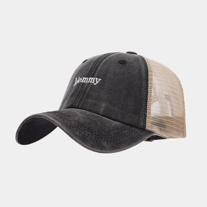 Detail of Mommy embroidery and vintage washed cotton mesh trucker hat construction