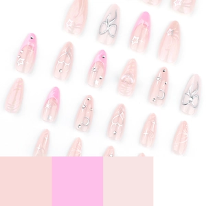 Pink almond press-on nails with 3D hearts, silver glitter stars, and rhinestones