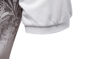 Close-up of white pique cotton polo shirt cuff with ribbing and side print detail