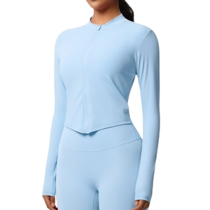 Veste de sport slim bleu clair avec col montant et passe-pouces pour fitness femme
