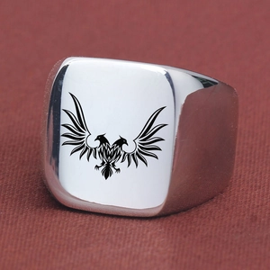 Detail of laser engraved double-headed eagle on square stainless steel signet ring