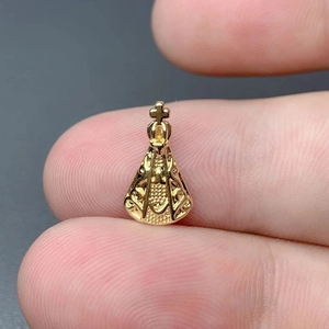 Exquisite 18k gold plated crown Virgin Mary pendant shown being held to detail its size