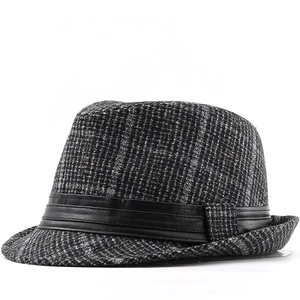 British style fedora hat in grey tweed with black leather band on white background