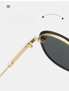 Detailed close-up of high-quality metal hinges on retro pilot-style aviator sunglasses