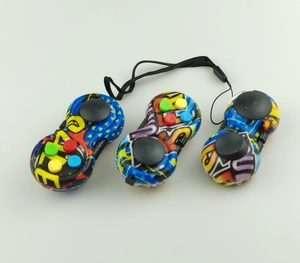 Close-up of graffiti pattern fidget pad toys with colorful buttons and black joystick