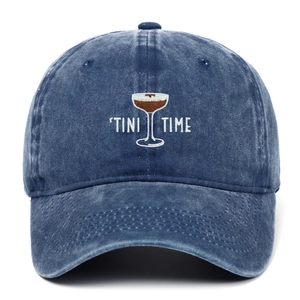 Close-up of Tini Time cocktail embroidery on a vintage washed blue denim baseball cap
