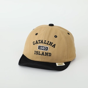 Detail of embroidered Catalina Island 1983 letters on a khaki and black soft brim baby cap