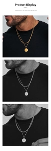 Close-up of double-layer titanium steel necklace featuring a round compass relief pendant