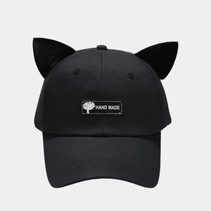 Black baseball cap with cute cat ears and handmade woven label for street style fashion