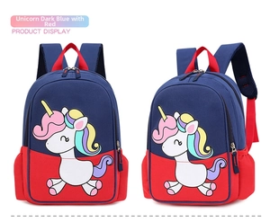 Detail of navy and red unicorn backpack with side mesh pockets and adjustable straps