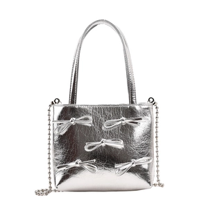 Minimalist silver square handbag with bow decorations and metal ball chain strap