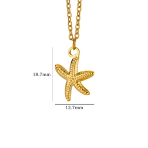 Macro detail of golden starfish pendant with dimensions 18.7mm height and 12.7mm width