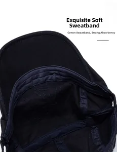 Detail view of the soft cotton sweatband and neat stitching inside the black flat cap