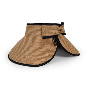 Detail of woven straw sun hat featuring a black fabric trim and large decorative bow