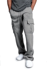 Side view of men's grey cargo pants with large utility pockets and knit fabric details